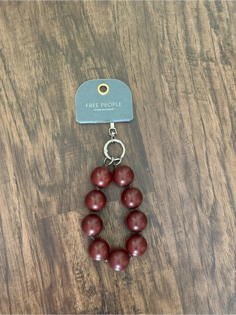 Free People Burgundy Beaded bauble phone wristlet